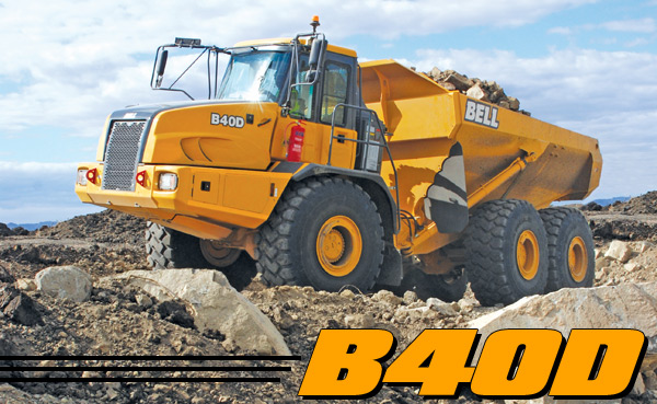 Alt text: B40D articulated dump truck from Bell moving rocks on a construction site.